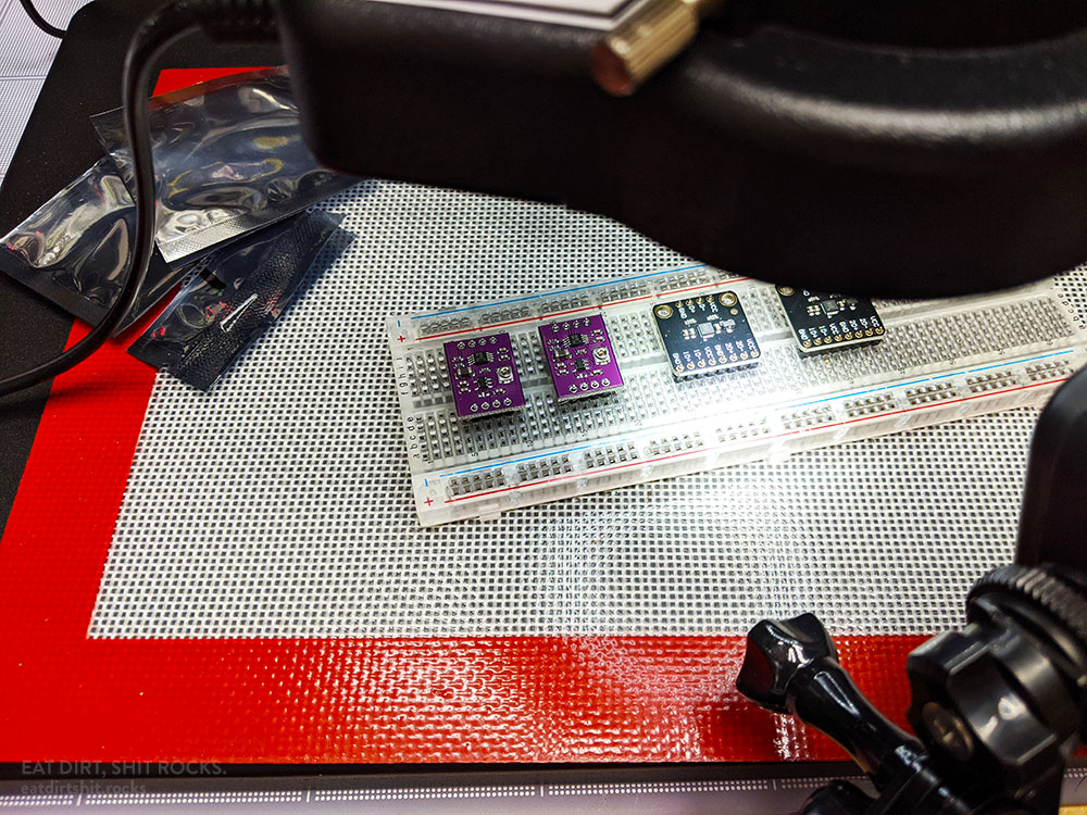 The four boards onto which I soldered header pins.