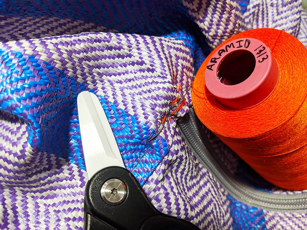 Fixed the zipper on a woven-polypropylene bag.